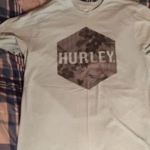 Hurley T shirt, baby blue. Fits a little big